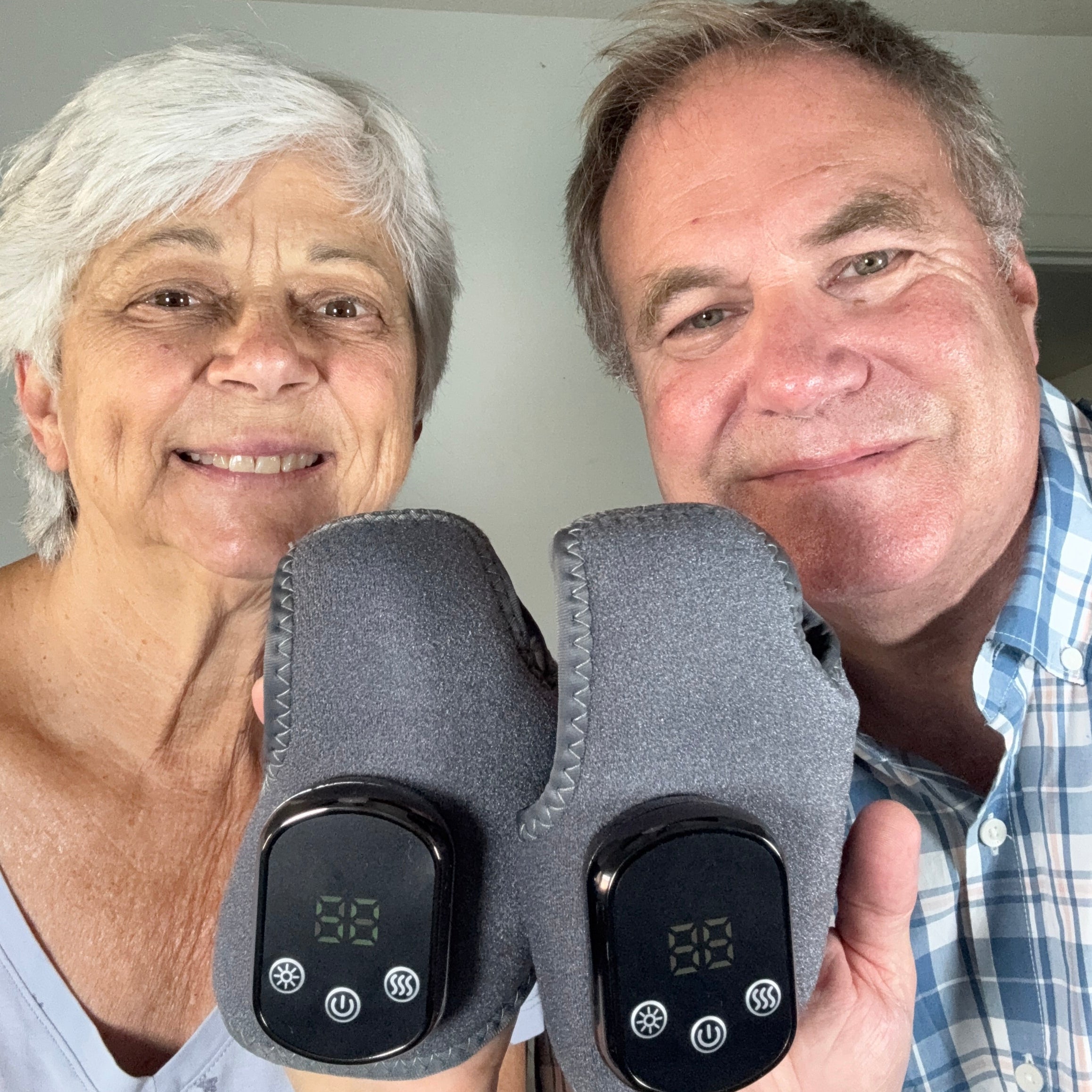 Couple using Soleva 3-in-1 Massager
